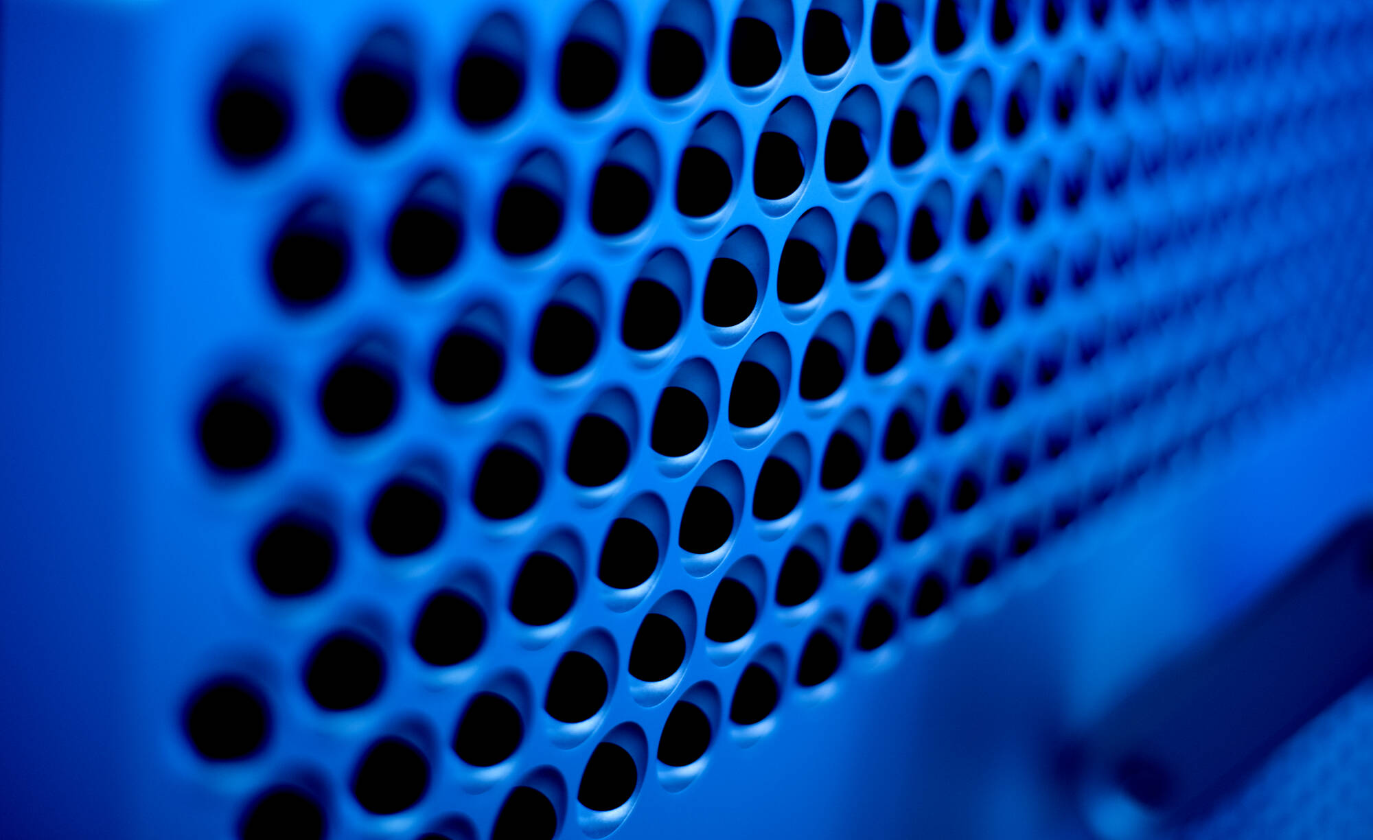 Detailed of a piece of hardware under blue lighting